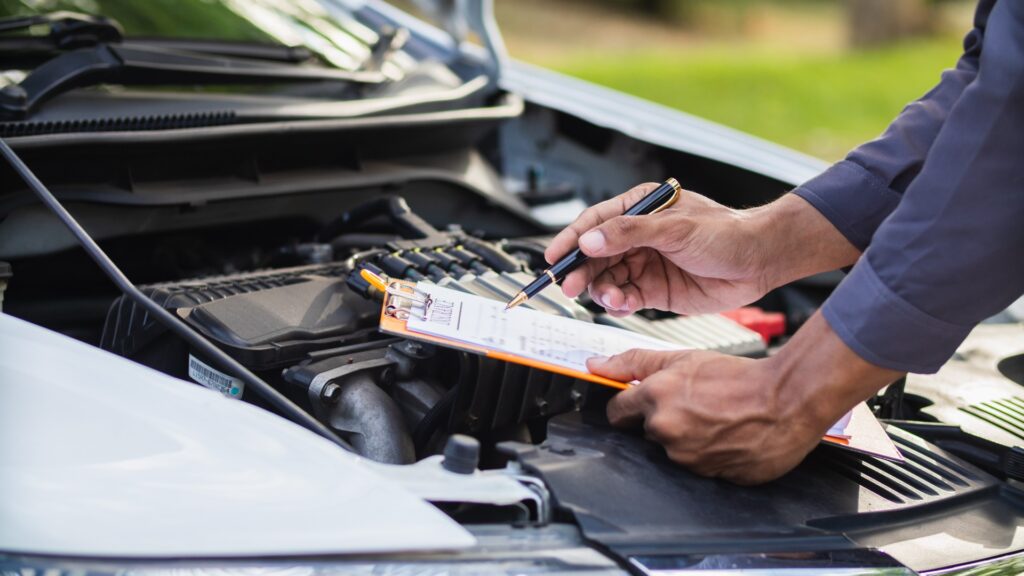 car service center mechanics are checking condition car and engine make sure they are ready use and in perfect condition according center warranty. periodic vehicle inspections for safety in driving.